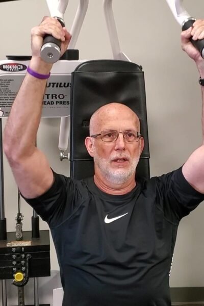 how to regain muscle mass after 60 using the shoulder press machine